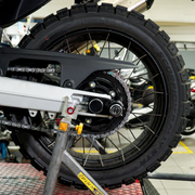 EasyBlock compatible with Aprilia Tuareg 660cc motorcycle, showing the black EasyBlock accessory mounted on the bike.