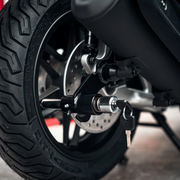 EasyBlock compatible with Honda Forza 125cc 2015-2025, showing the sleek black EasyBlock product for scooter security.