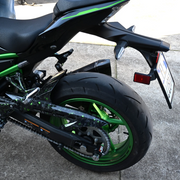 EasyBlock compatible with Kawasaki Z900cc motorcycle, showing the black EasyBlock component installed on the bike.