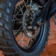 EasyBlock compatible with KTM Duke 990cc motorcycle, showcasing the black and orange engine guard attachment.
