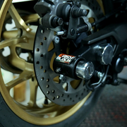 EasyBlock compatible with Yamaha T Max 530cc and 560cc motorcycle, 2012-2025, showing the black EasyBlock device on the bike.