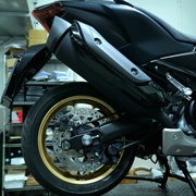 EasyBlock compatible with Yamaha T Max 530cc and 560cc motorcycle, 2012-2025, showing the easy installation part.