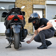 EasyBlock compatible with Yamaha X Max 300cc and Tricity 300cc scooter, showing the sleek black protective accessory.
