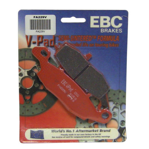 EBC Off Road Motorcycle Semi-Sintered Brake Pad FA229V installed on a motorcycle brake rotor with visible metal backing plate.