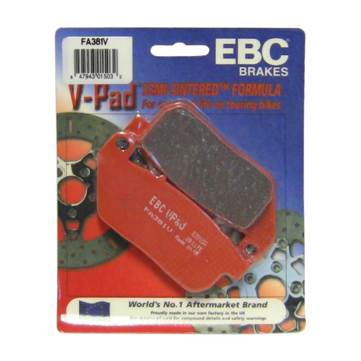 EBC Brakes off-road motorcycle semi-sintered brake pad FA381V with textured surface and metal backing plate installed on brake caliper