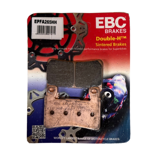 EBC Extreme Pro Sinter Brake Pads installed on a vehicle's brake caliper, showcasing durable brake pad design and material.