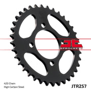 JT Sprockets JTF253.14, JTR257.39, and JTC420HDR098SL sprockets set displayed, featuring durable metal construction and detailed gear teeth.