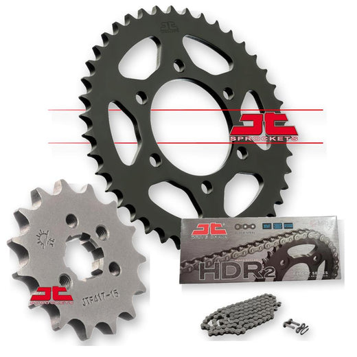 JT Sprockets JTF417.15, JTR468.46, JTC428HDR132SL chain sprockets displayed on a workbench with tools