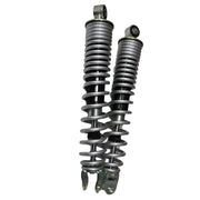 Max Motorcycles rear shock absorber set SHK109 showing durable metal coils and mounting components on a vehicle suspension system.