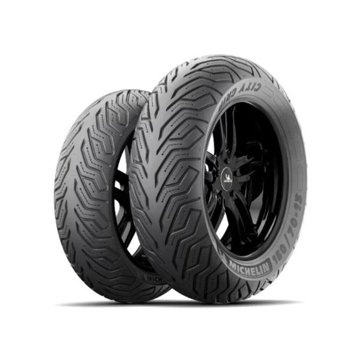 Michelin City Grip2 130/70-16 motorcycle tire with tubeless design, black rubber surface, tread pattern visible.