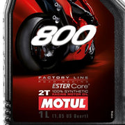 Motorcycle 2T engine oil, Motul 800 2T Factoryline Road Racing 1L bottle, with product label visible.