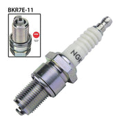 NGK BKR7E-11 single spark plug for automotive engines, showing the metal tip and ceramic insulator in the image.
